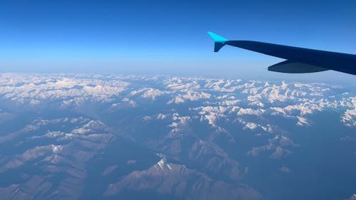 A Mountain Landscape Seen from an Airplane Window 