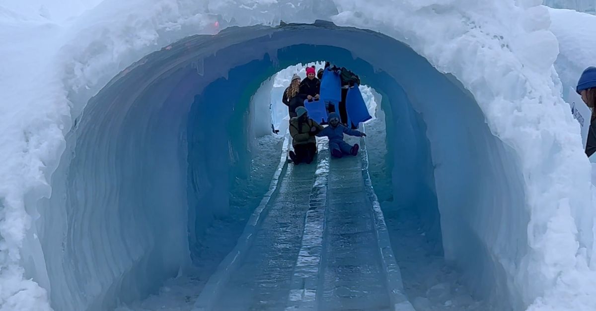 Ice Block Sliding People are sliding down a tunnel in an ice cave Free Stock Video ...