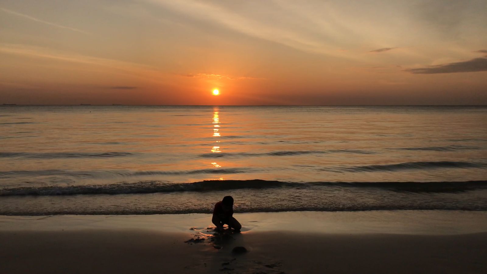 Back View of Boy Sitting on Beach and Looking at Sunset Free Stock ...