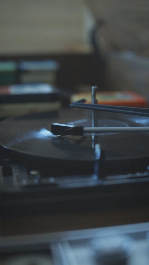 A Vinyl Record Spinning on a Turntable 