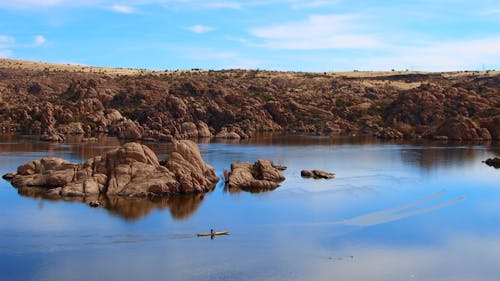 A Person Kayaking on Watson Lake in Prescott, Arizona