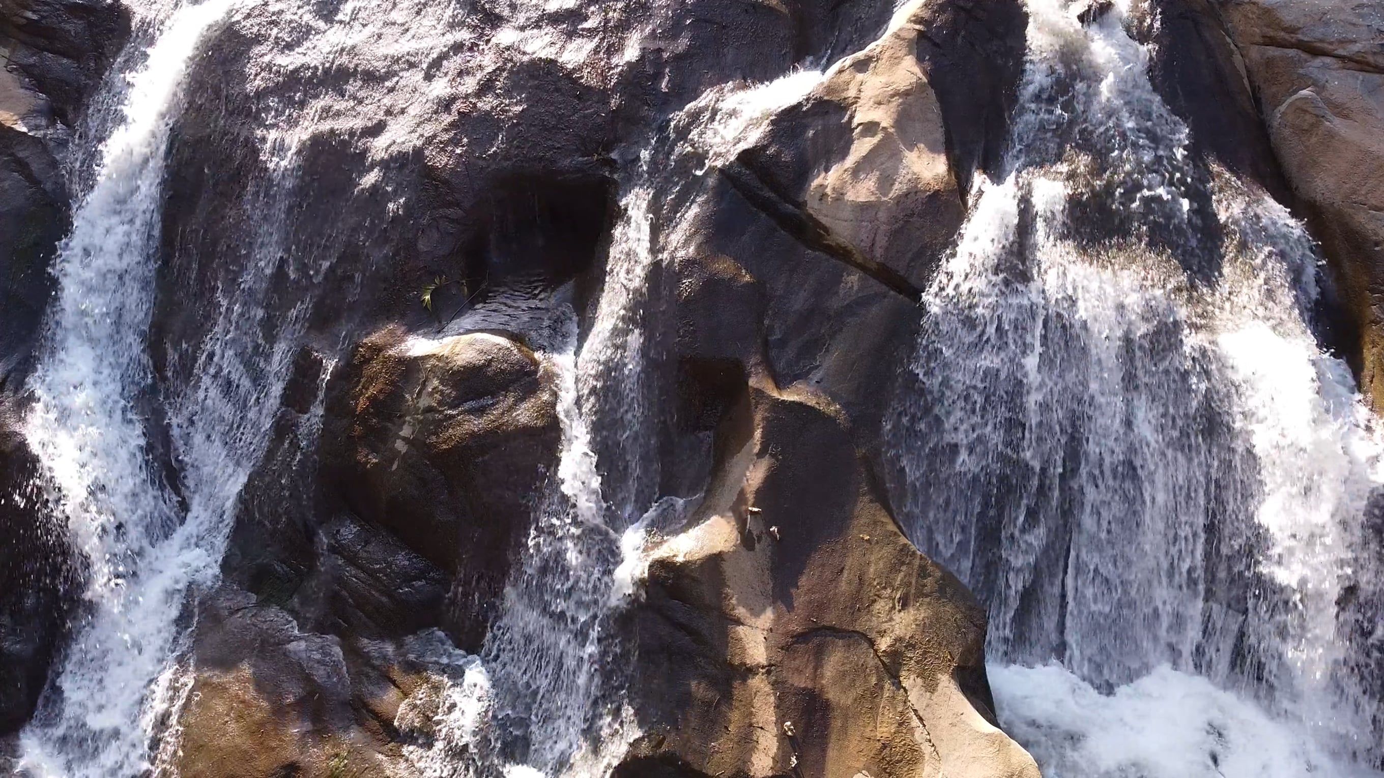 A waterfall is shown in this photo Free Stock Video Footage, Royalty ...