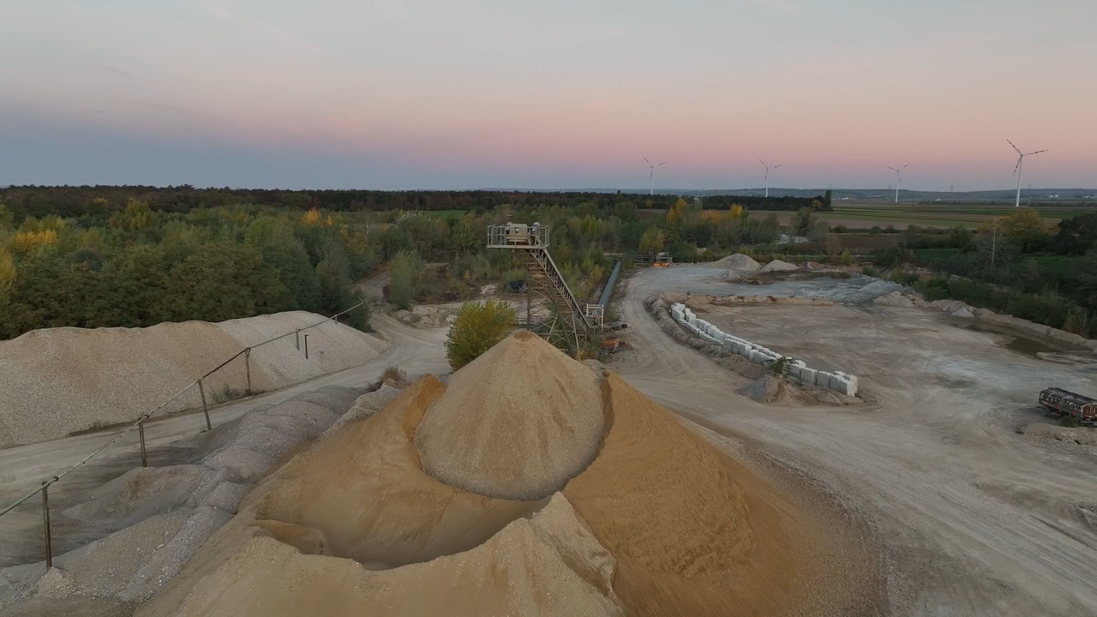 An aerial view of a sand pit with a conveyor belt Free Stock Video ...