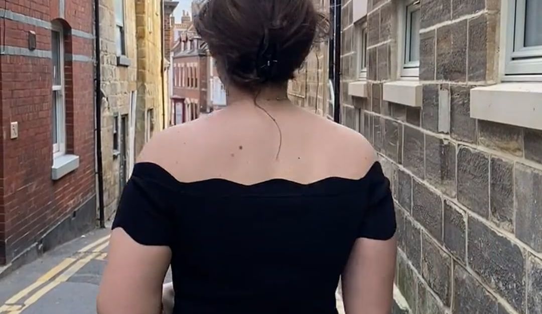 Narrow Backside Back View of a Young Woman Walking Down a Narrow Street Free Stock ...