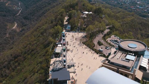 the city of Almaty and the Ferris wheel on the kok tobe view from a drone