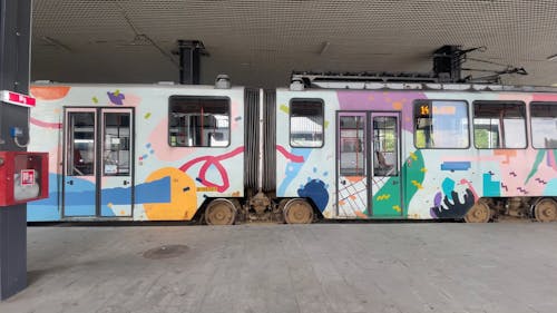 A Colorful Tram Leaving the Station