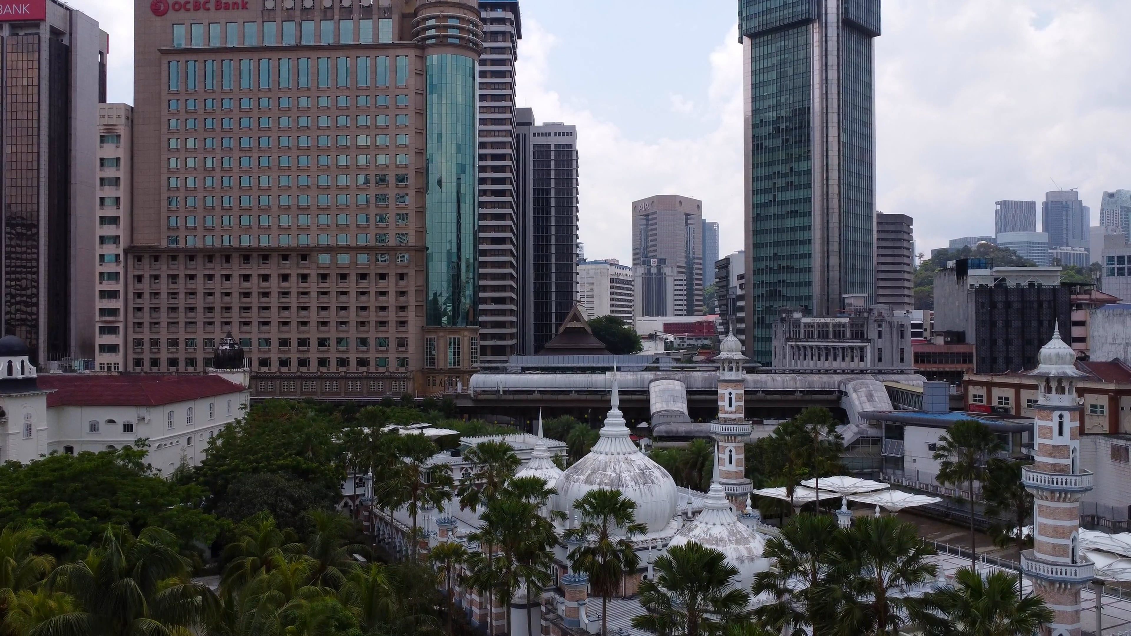 A view of a city with tall buildings and palm trees Free Stock Video ...