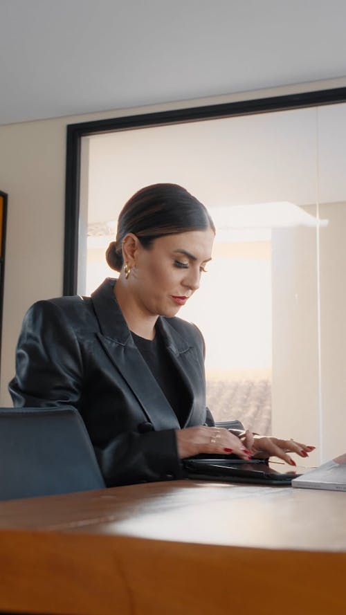 A Businesswoman Using a Laptop 