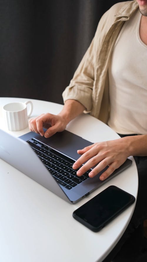 A Man Using a Laptop