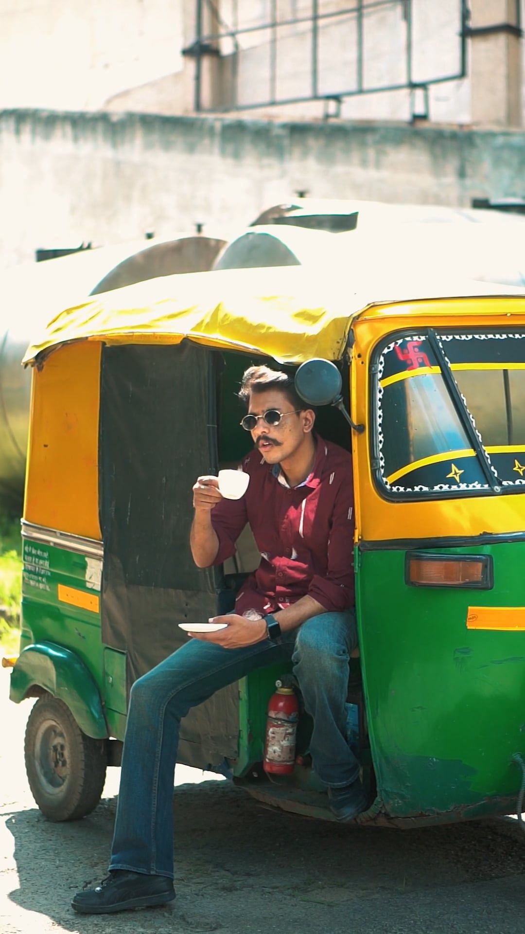 A man sitting in a rickshaw with a cup of coffee Free Stock Video ...