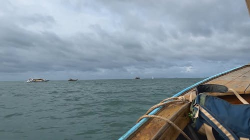 A Boat Ride under a Grey Sky