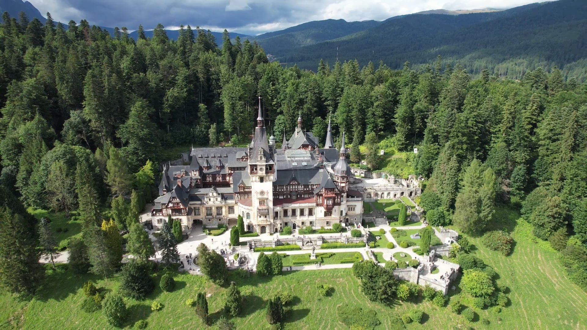 An aerial view of a castle surrounded by trees Free Stock Video Footage ...