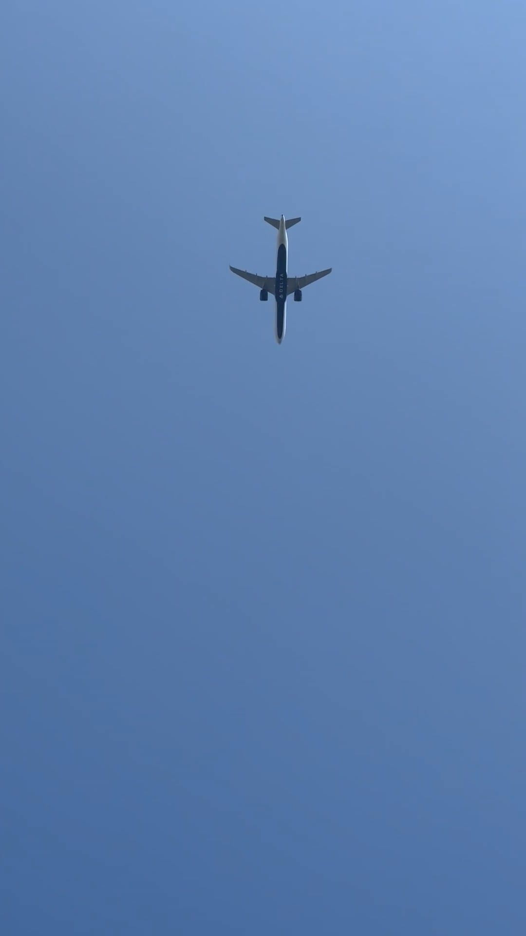 A plane flying in the blue sky with a blue sky Free Stock Video Footage ...