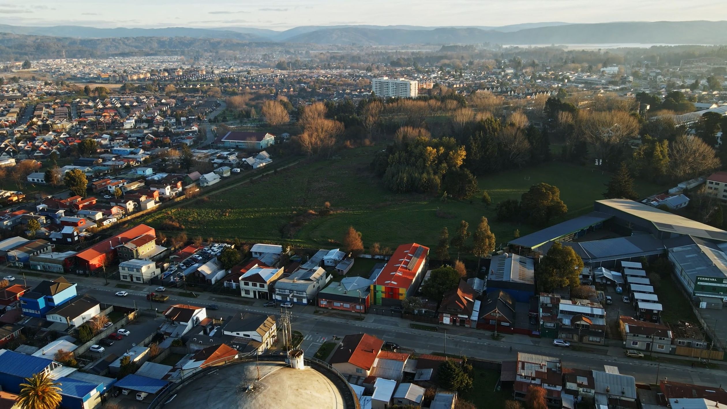 An aerial view of a city with a water tower Free Stock Video Footage ...