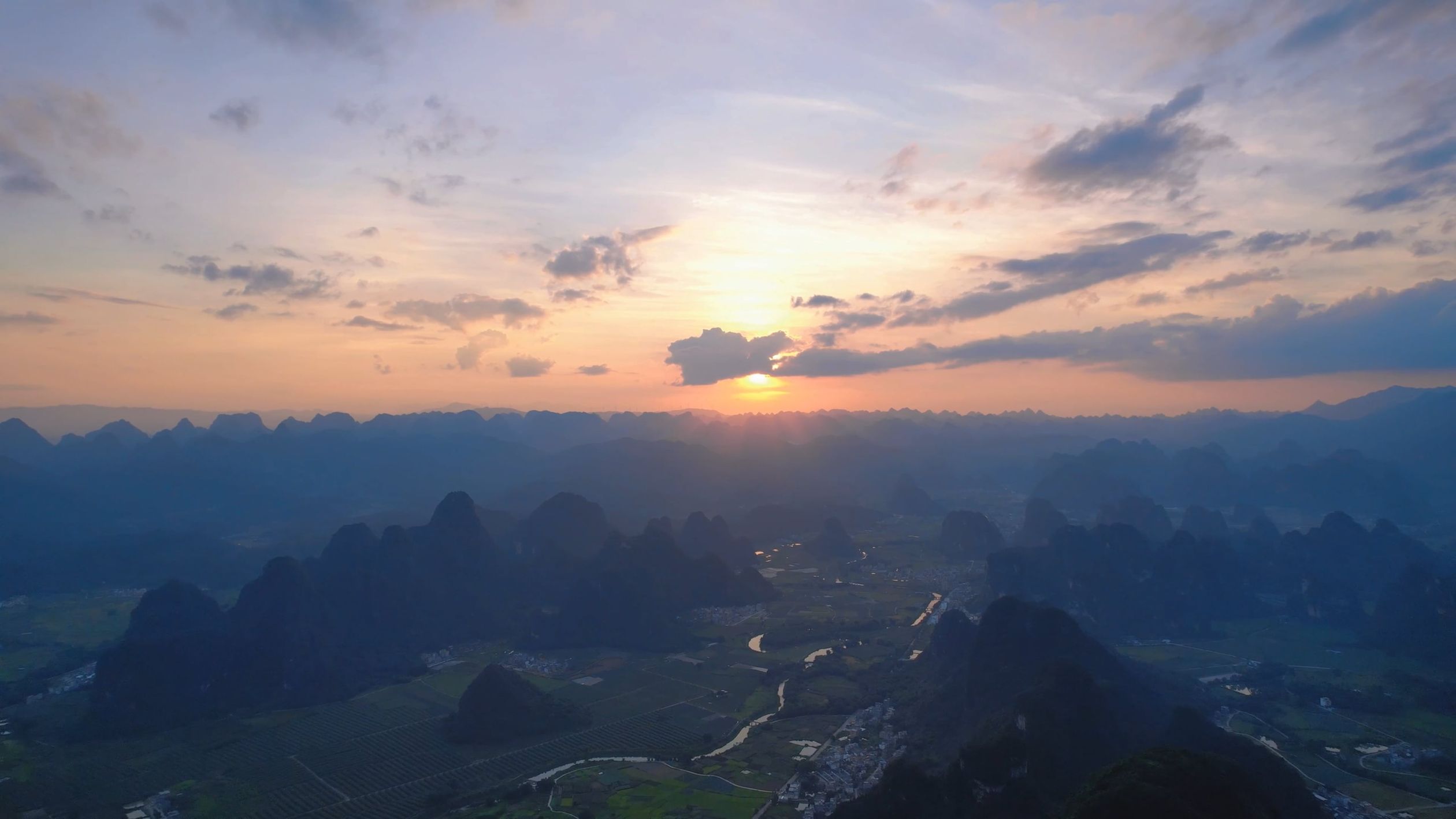 Drone Footage of a Sunset over a Mountain Landscape Free Stock Video ...