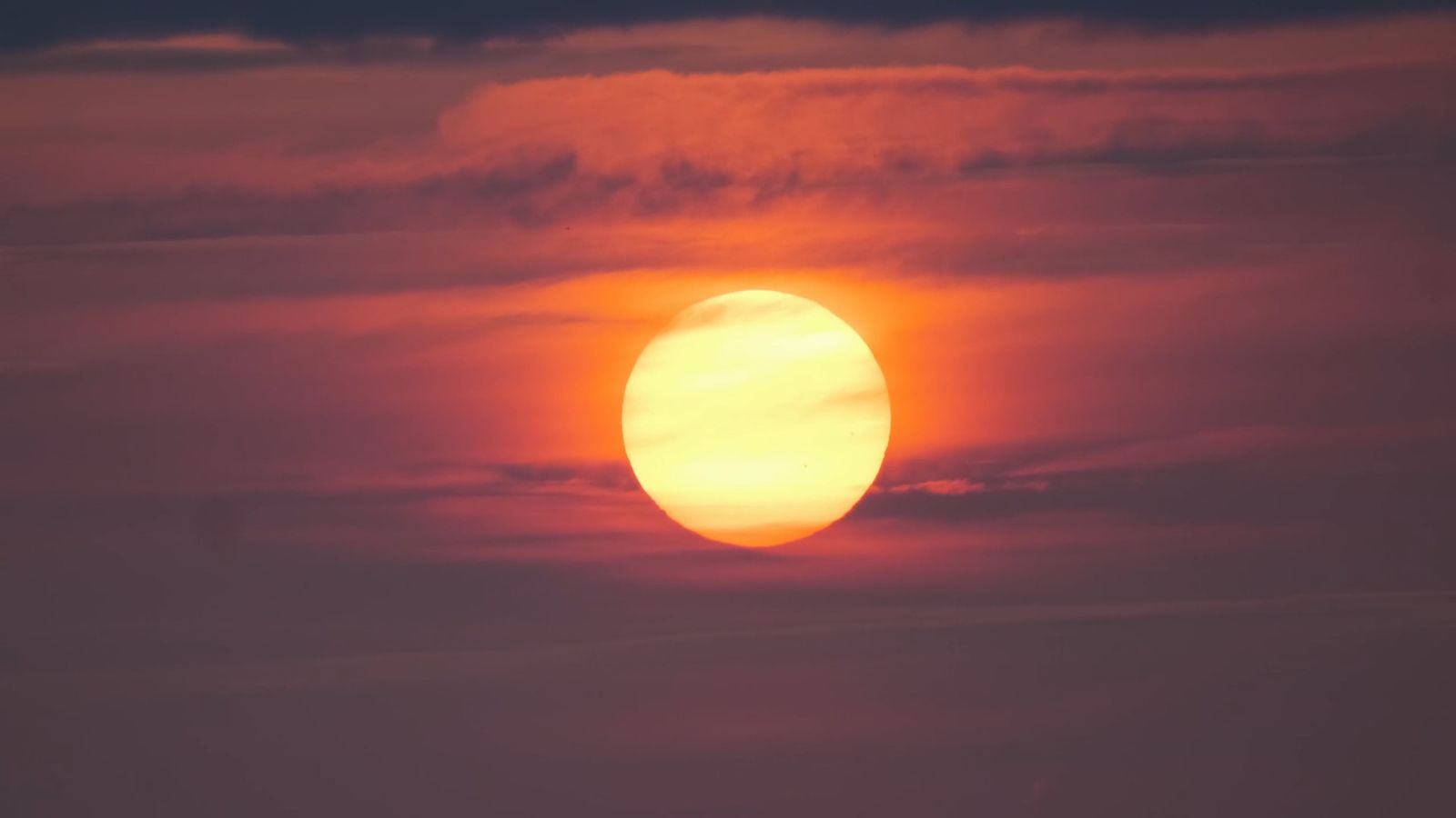 Serene Sunset Over Clouds with a Golden Glow Free Stock Video Footage ...