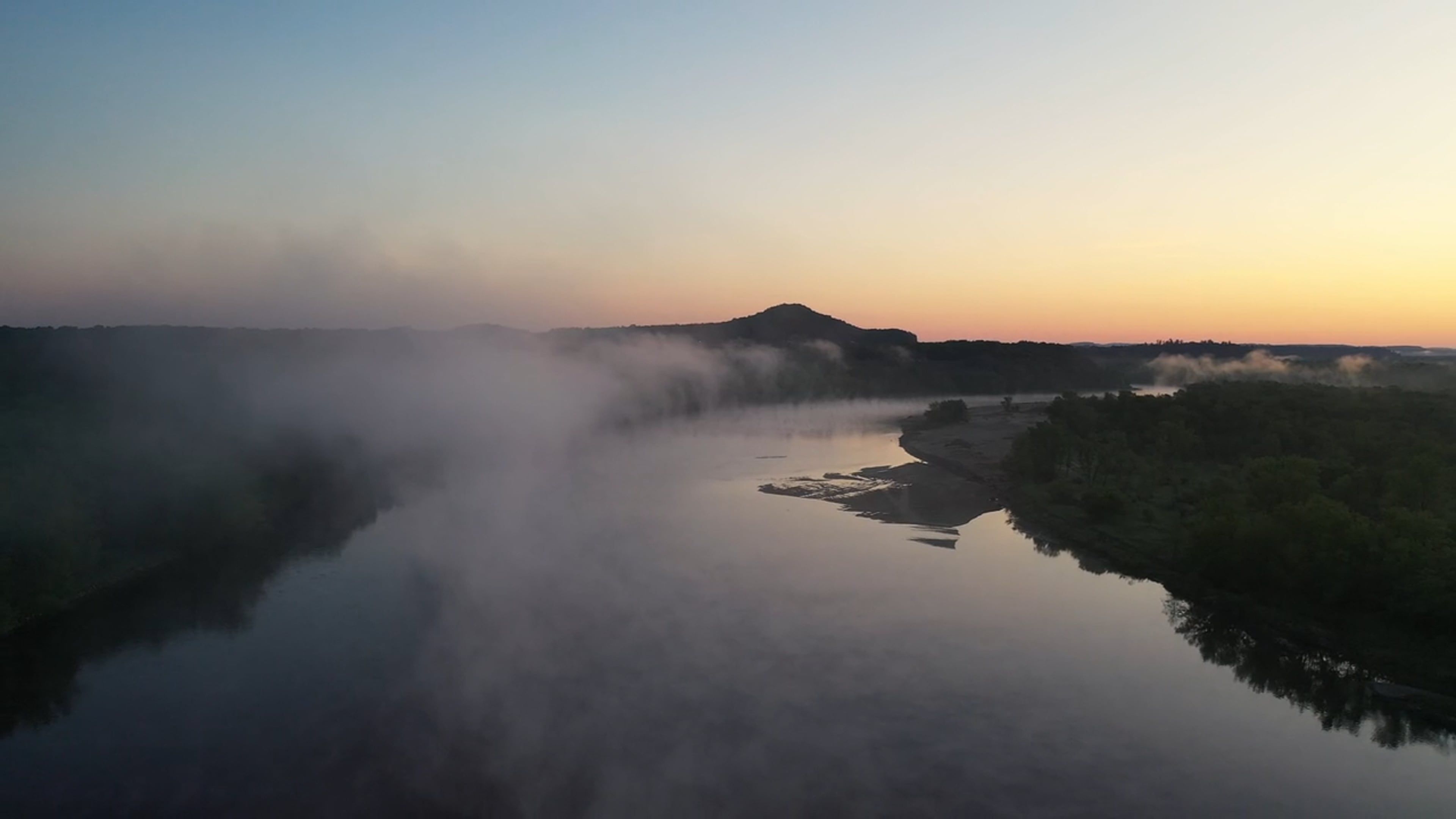 A river with mist rising from it at sunset Free Stock Video Footage ...
