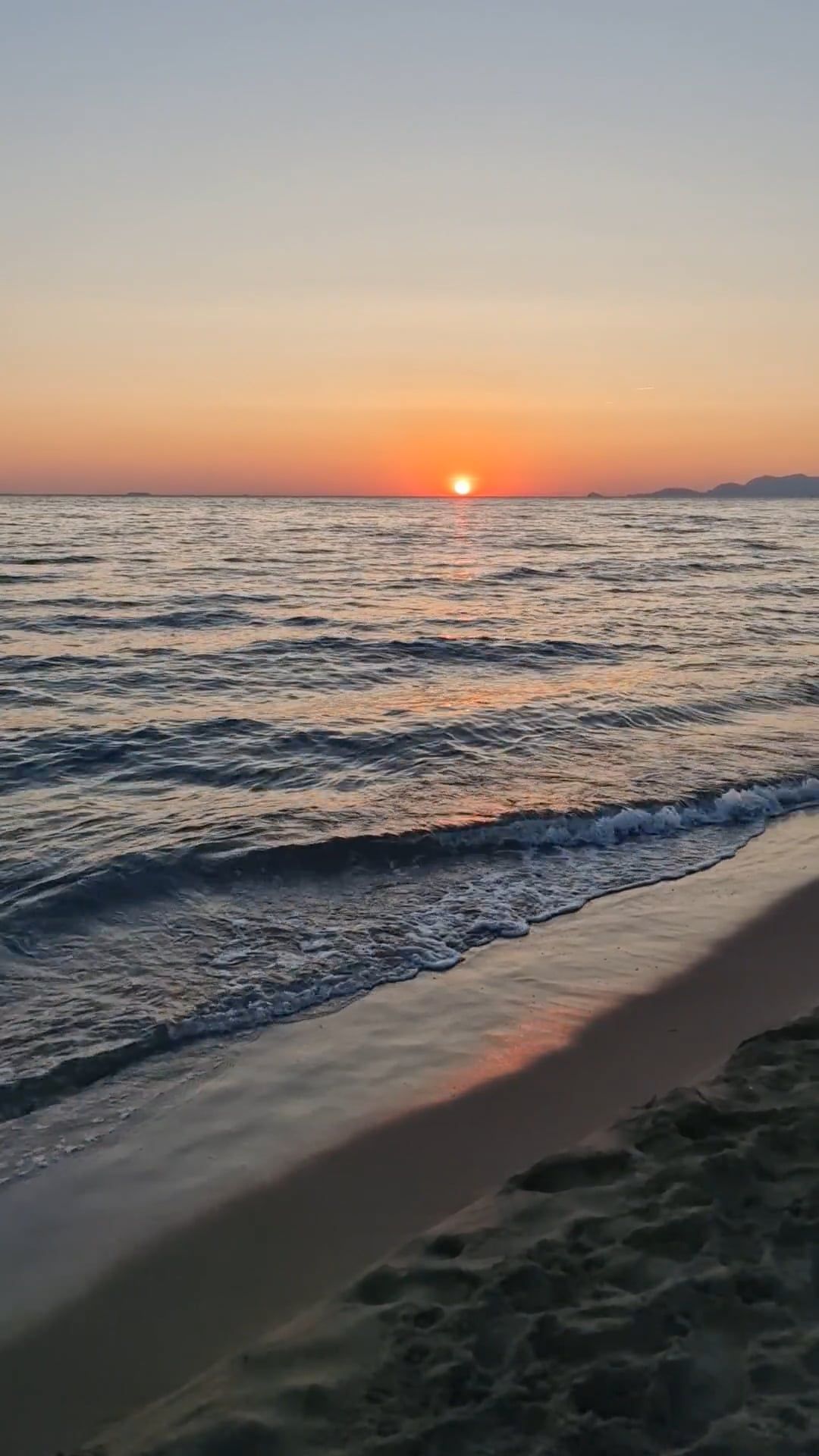 A sunset on the beach with waves and sand Free Stock Video Footage ...