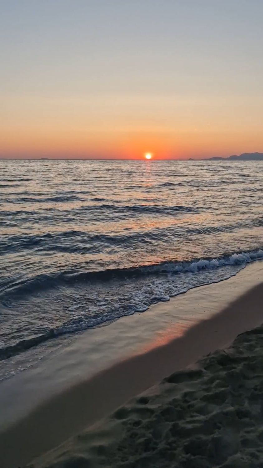 A sunset on the beach with waves and sand Free Stock Video Footage ...