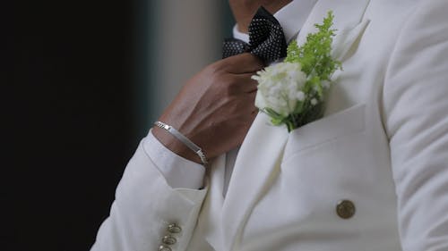 White Suit with the Groom 