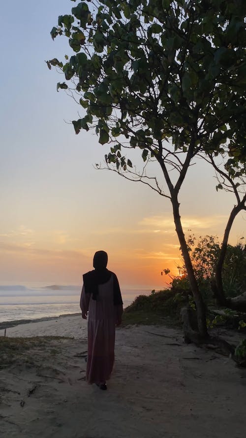 Walking Hijab Woman With Sunset View