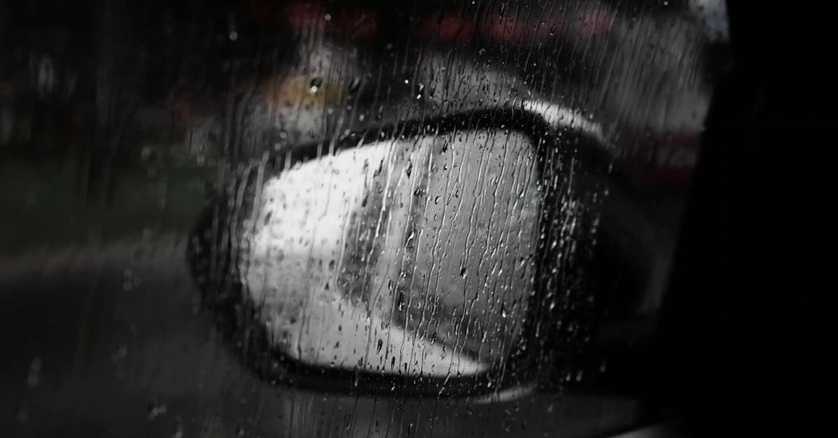 Car In Rai A car is seen in the rain with a reflection Free Stock Video Footage ...
