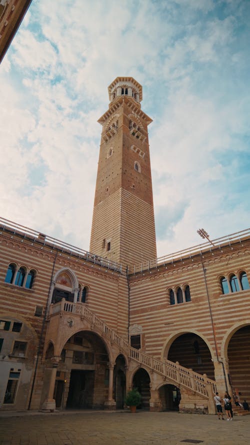 Vertical cinematic view of Torre dei Lamberti