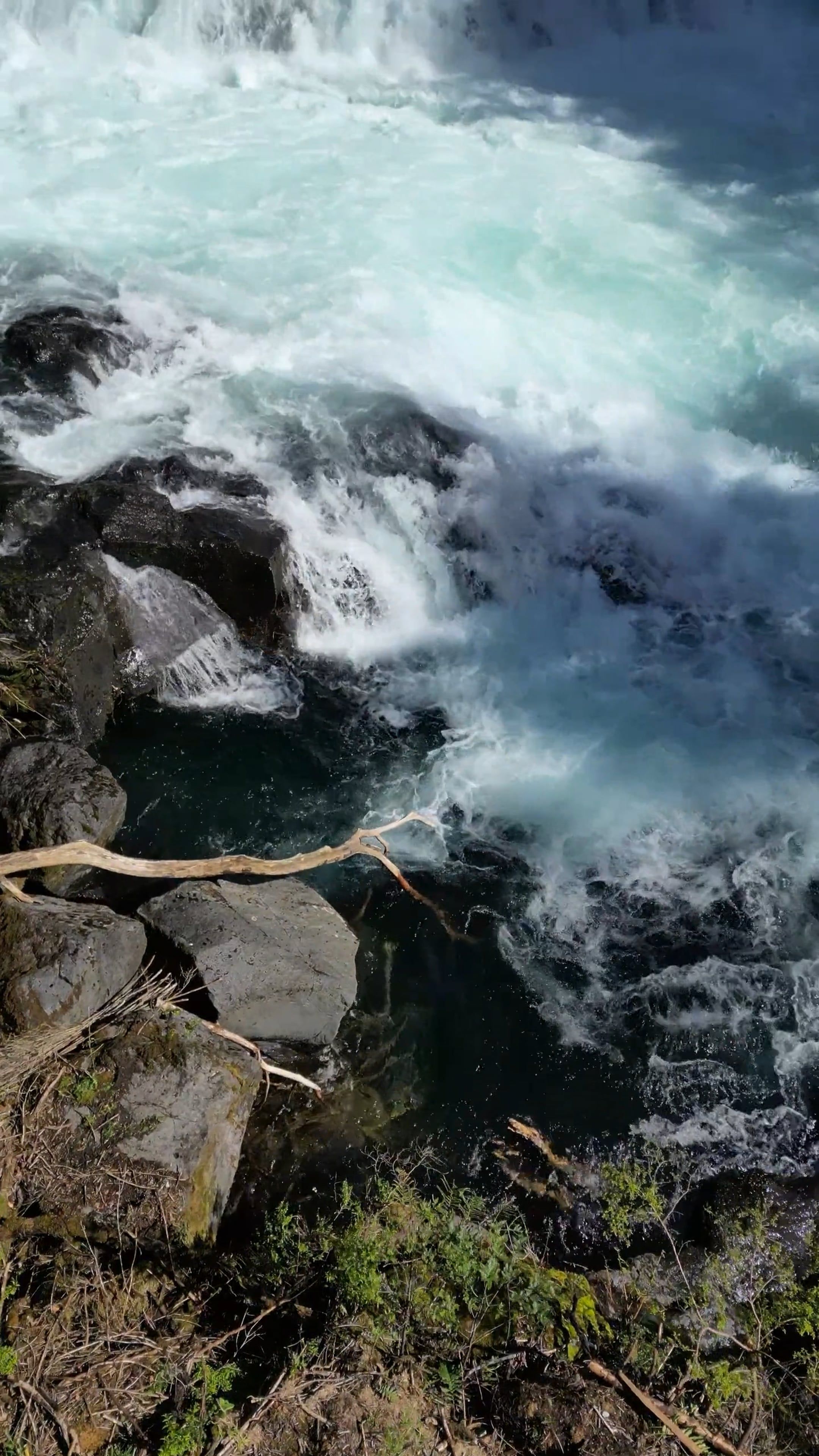 A river with a waterfall and trees in the background Free Stock Video ...