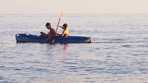 Kids canoeing at the Mediterranean Sea	