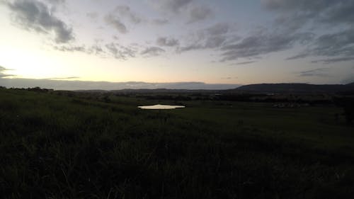 Sunrise over farmland timelapes