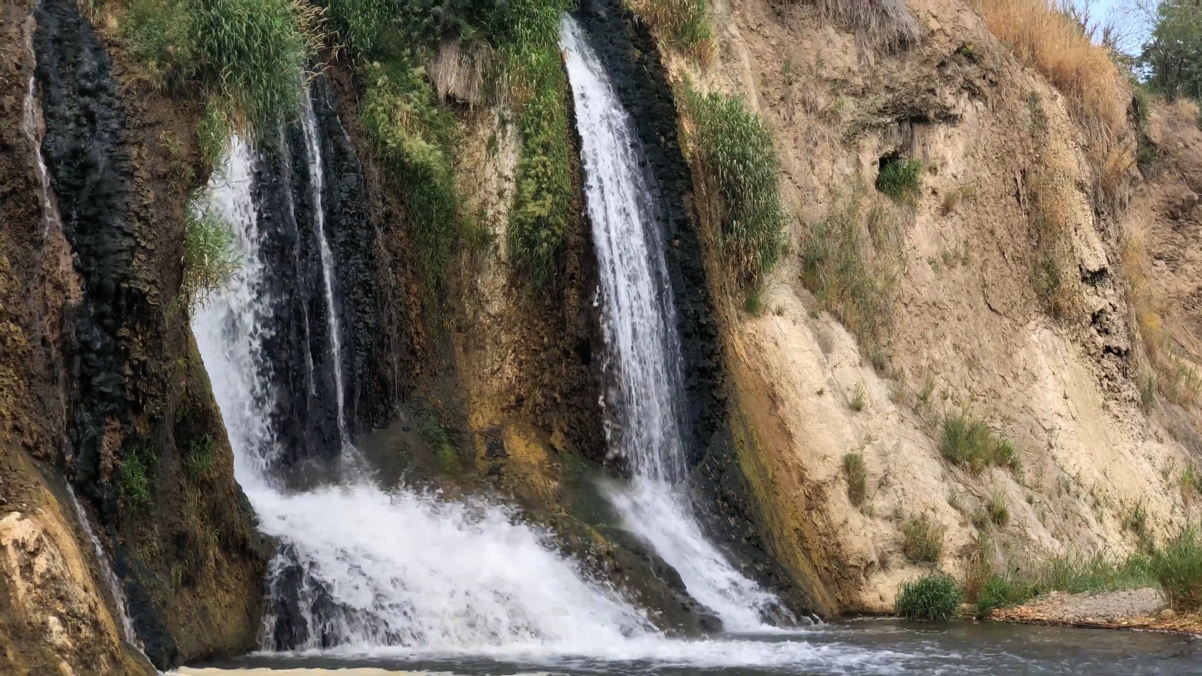 A waterfall is located in the middle of a river Free Stock Video ...