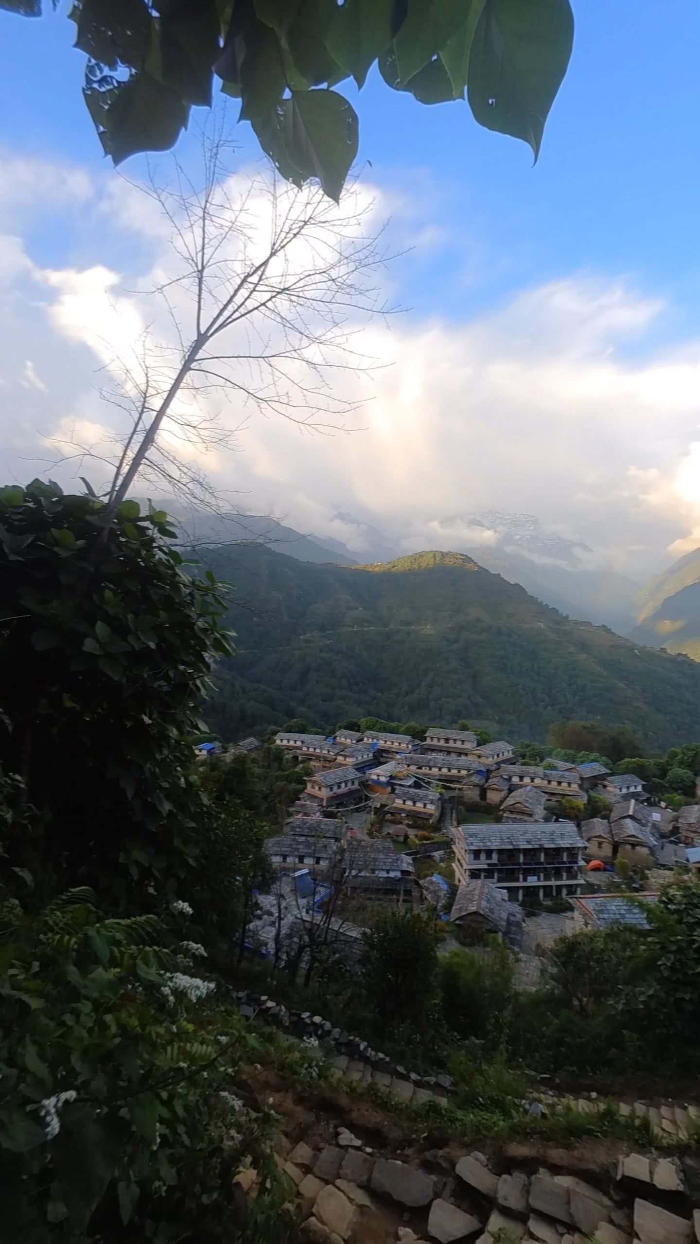 A view of a small town with mountains in the background Free Stock ...