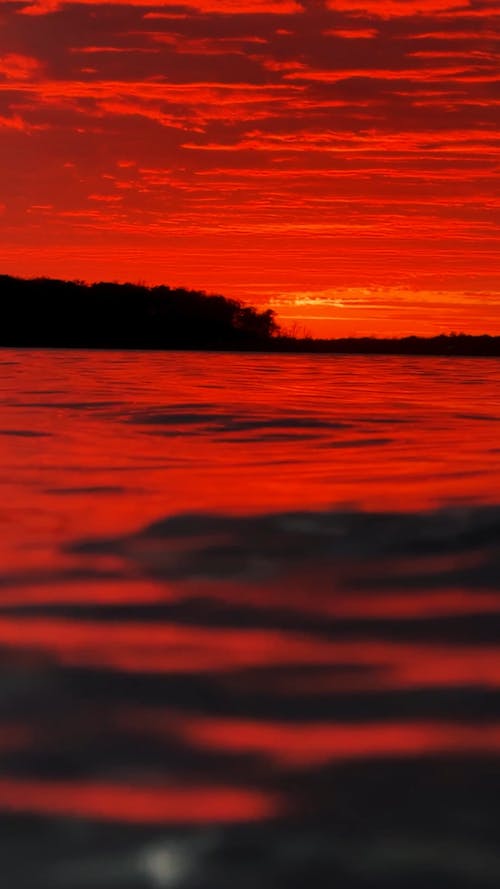 Vivid Sunset Over Lake Reflection
