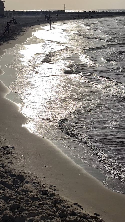 Silver waves on Tel Aviv beach, Israel, Mediterranean Sea 