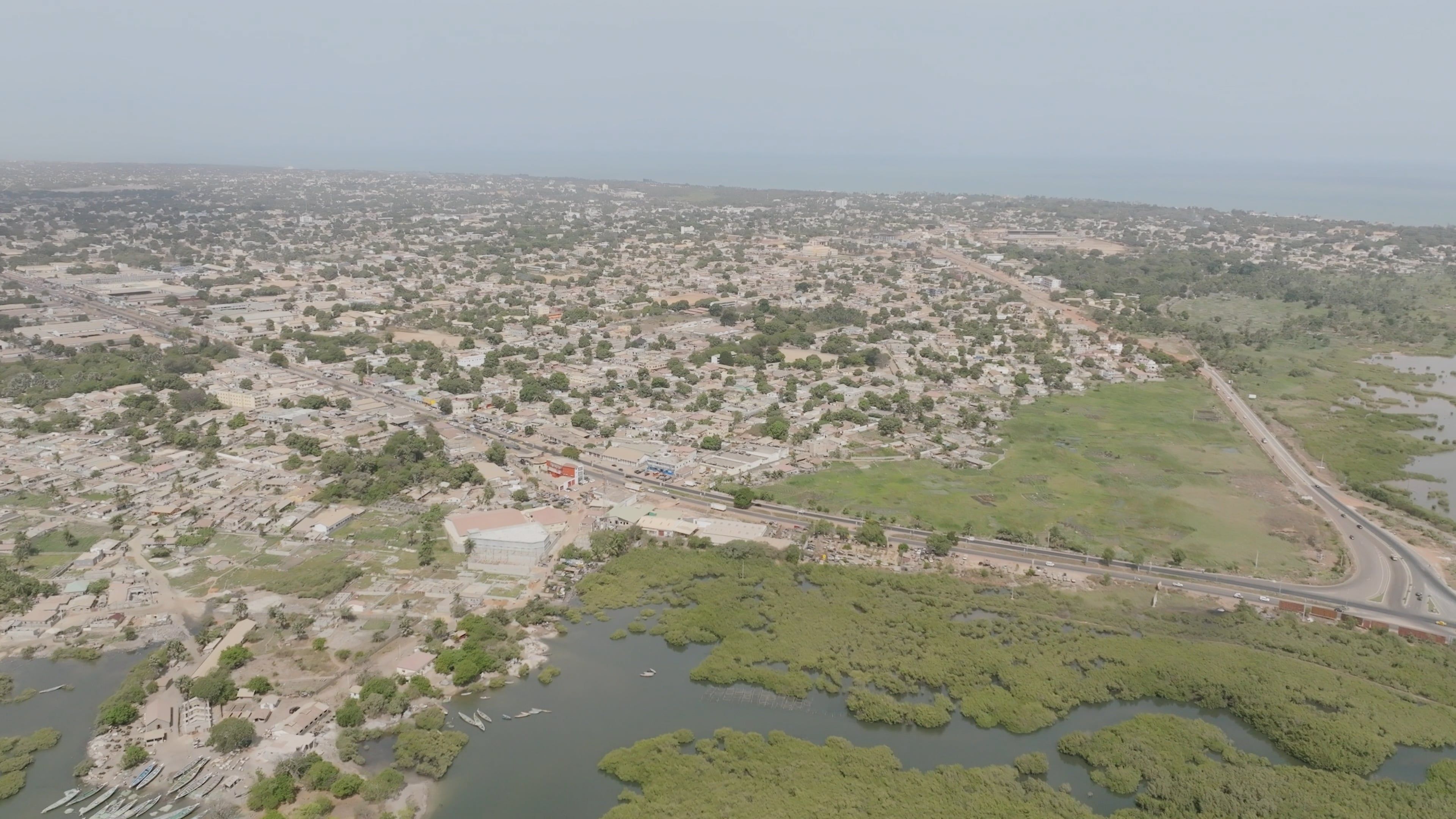 An aerial view of a city with a large green area Free Stock Video ...