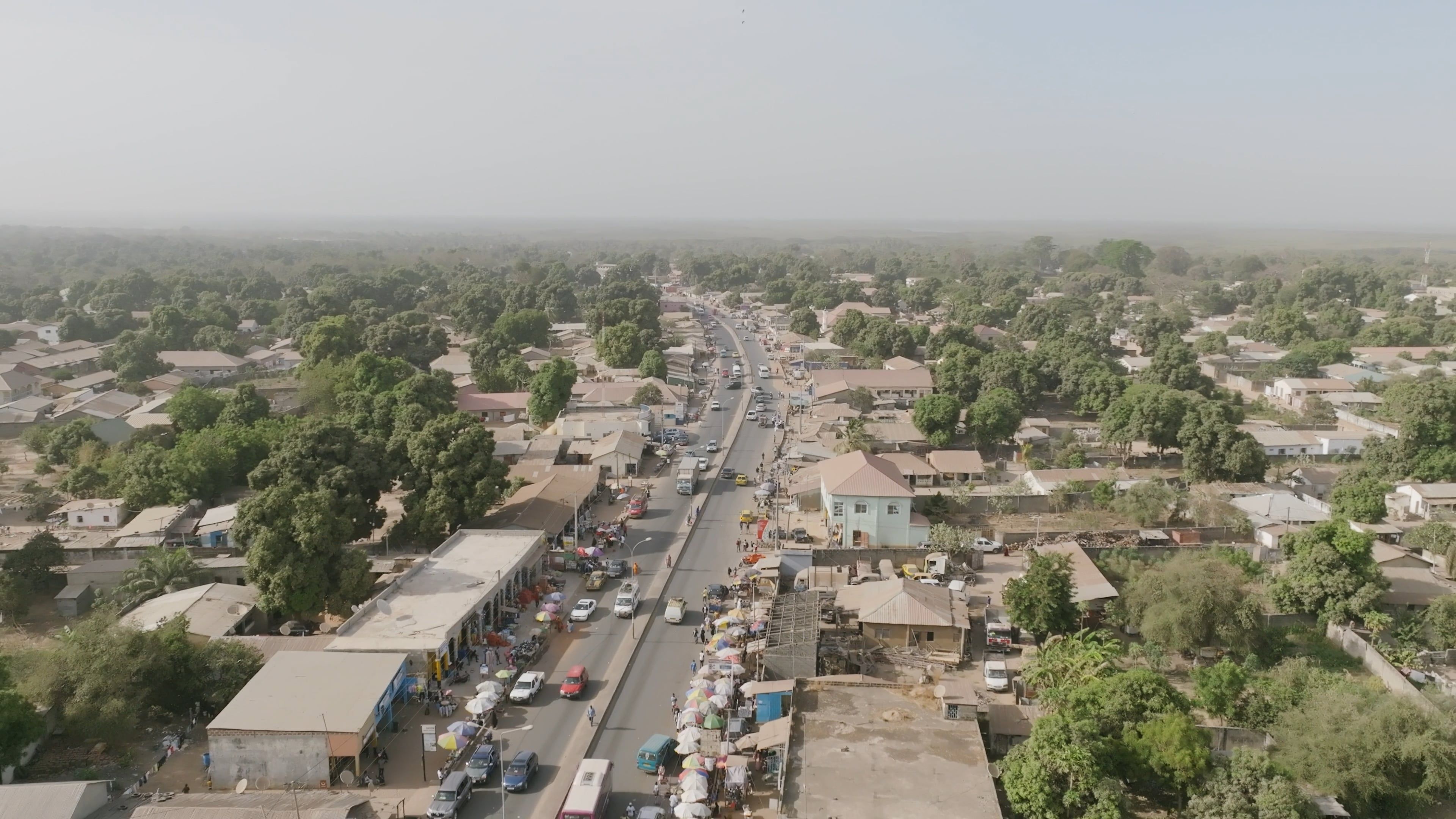 An aerial view of a city with cars and trees Free Stock Video Footage ...