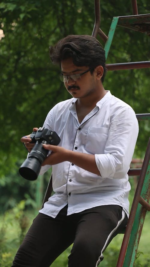 Photographer Clicking Picture with a Dslr.