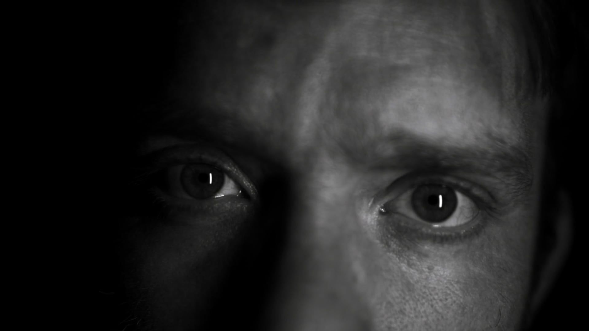 A man is looking at the camera with his eyes closed Free Stock Video ...