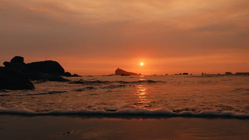 Golden Orange Sunset On The Ocean Coast Waves