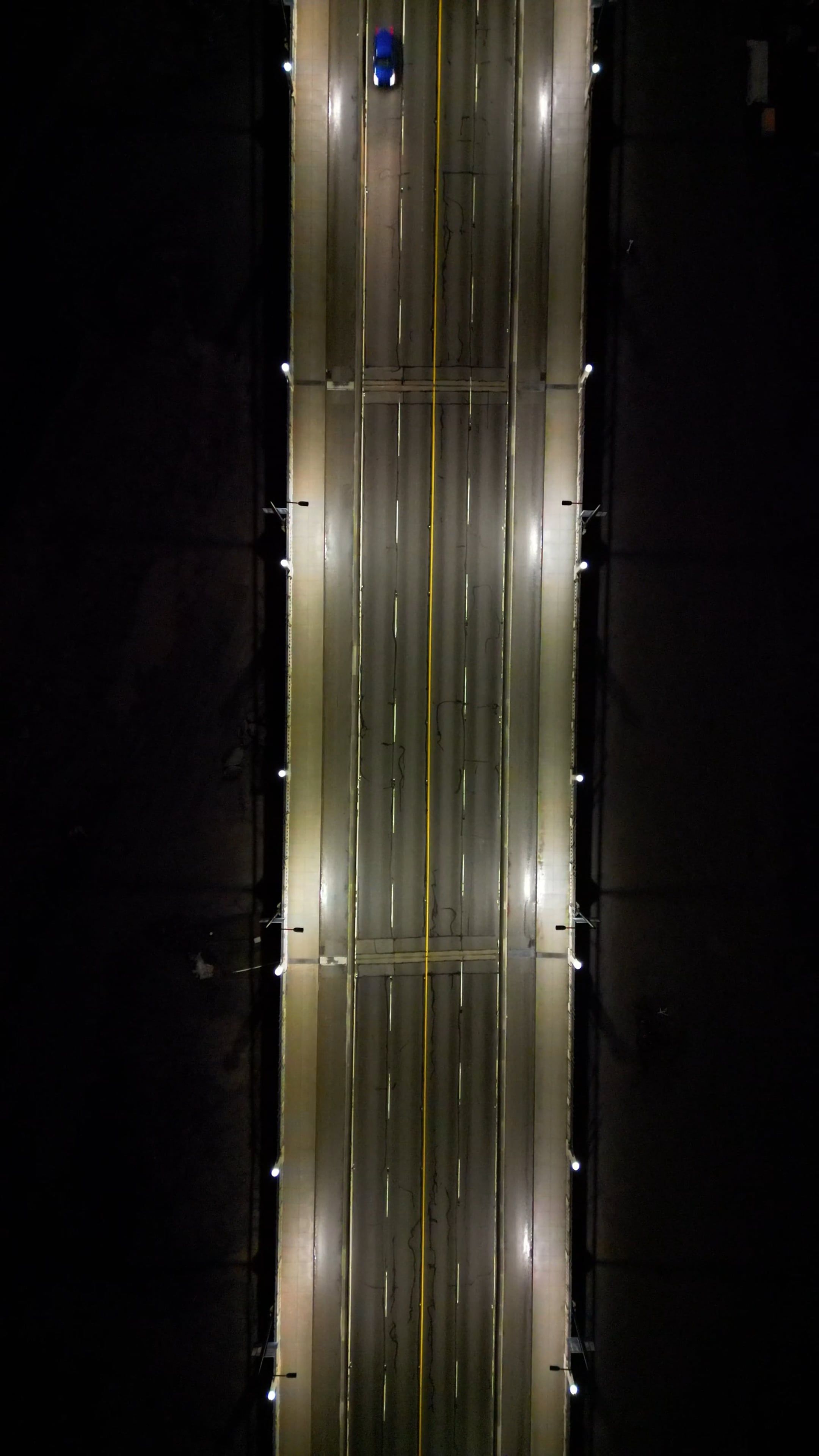 a city at night with a bridge in the background 19220242 — free pexels stock footage