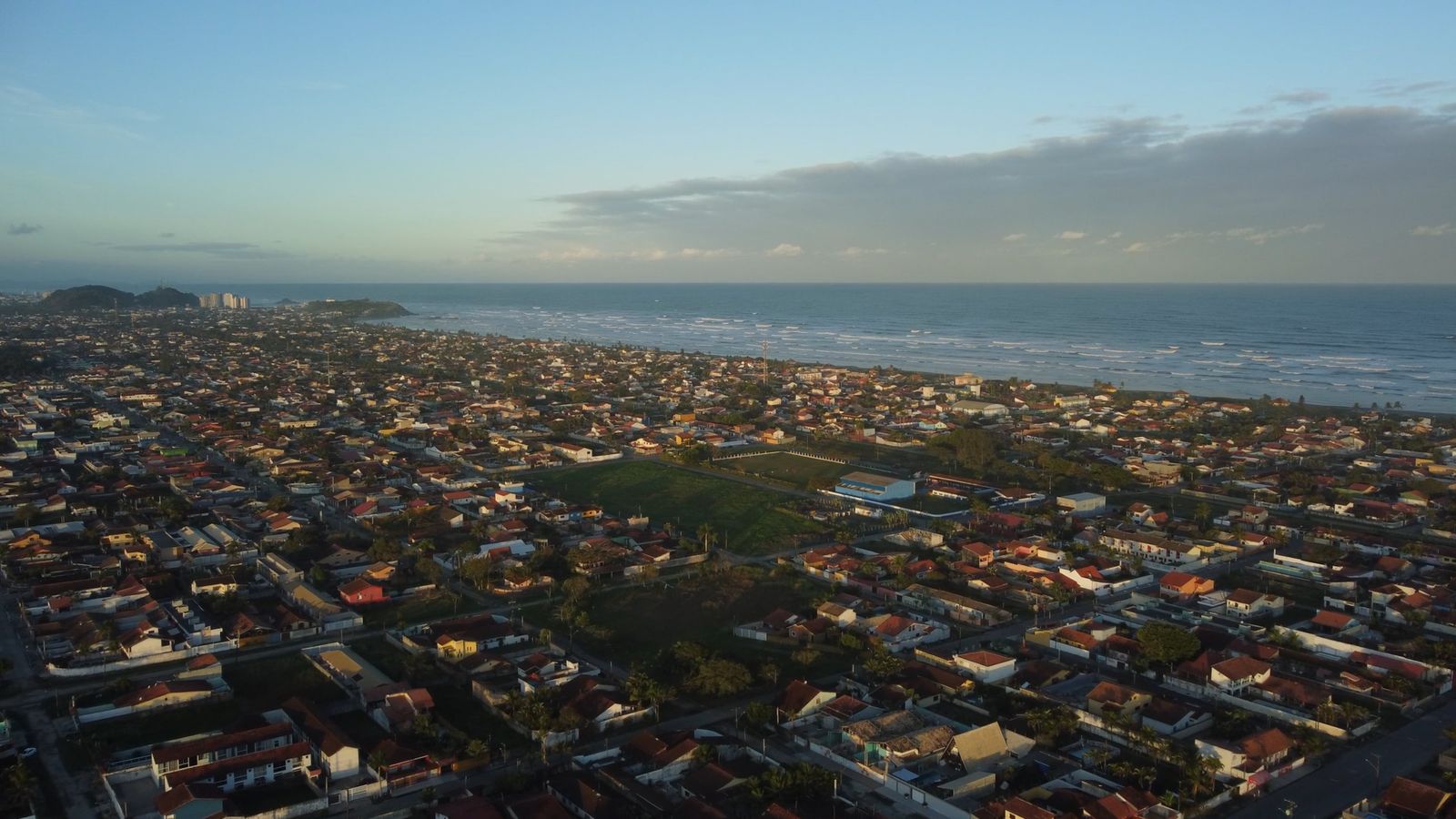 Scenic Nighttime Aerial View of Coastal City Beach Free Stock Video ...