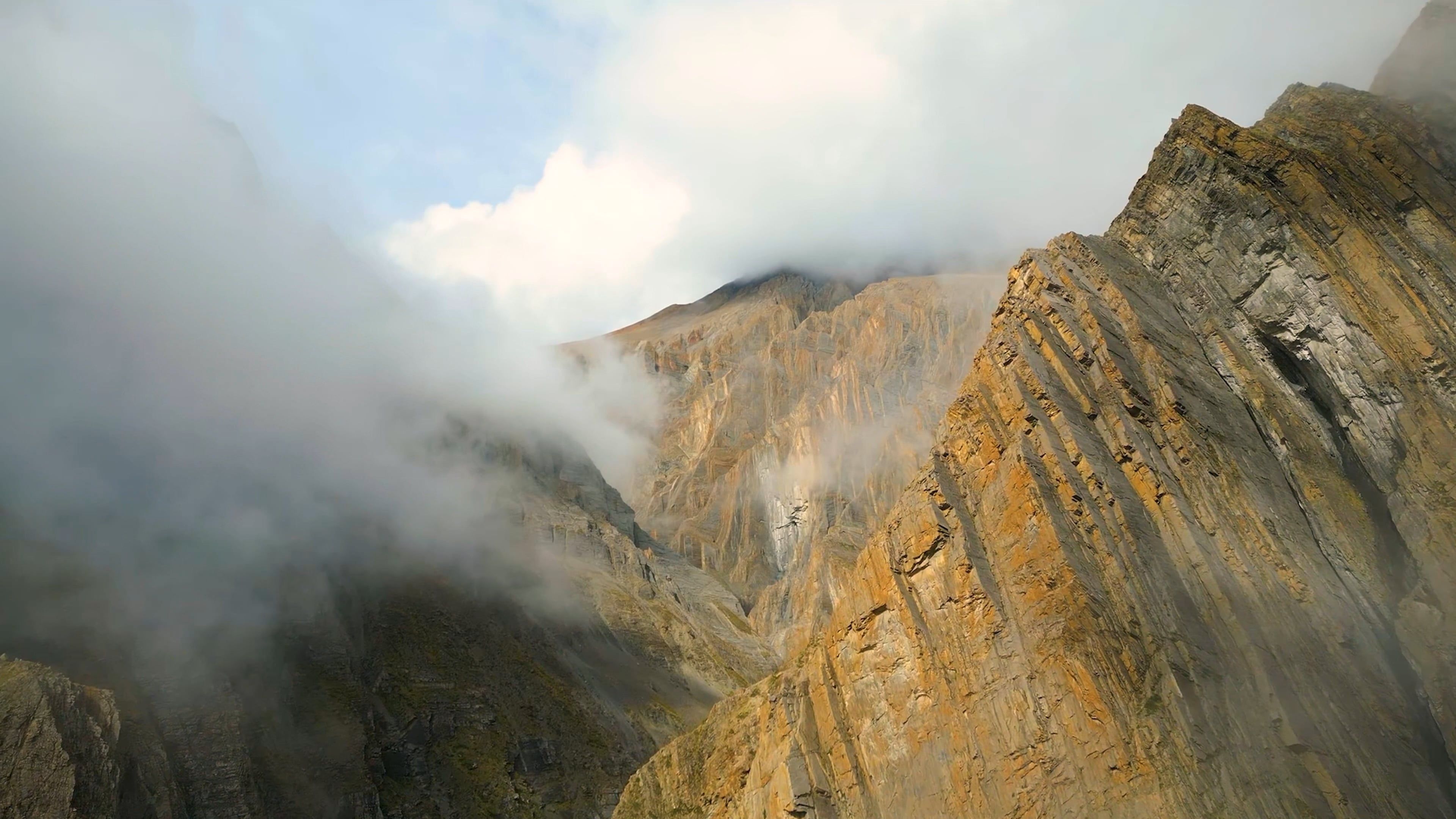Dramatic Aerial View of Foggy Mountain Peaks Free Stock Video Footage ...