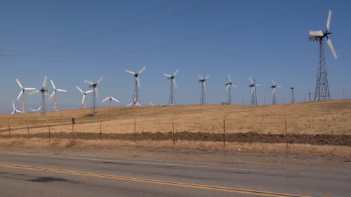 Windmills in California Along a Road Part of a Series