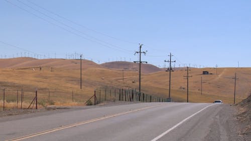 Windmills in California Along a Road Part of a Series