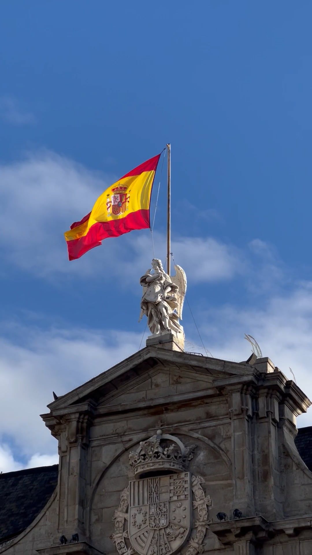The spanish flag is flying over a building Free Stock Video Footage ...