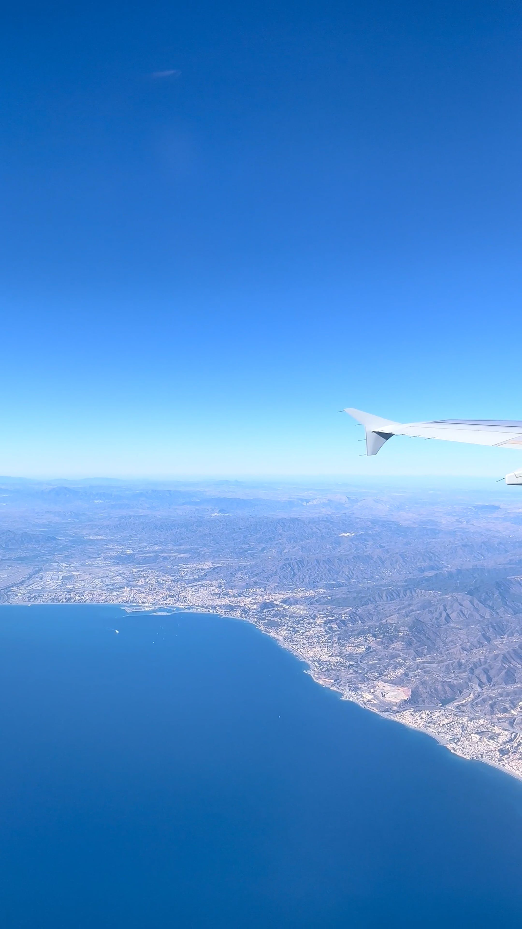 A view of the ocean from an airplane wing Free Stock Video Footage ...
