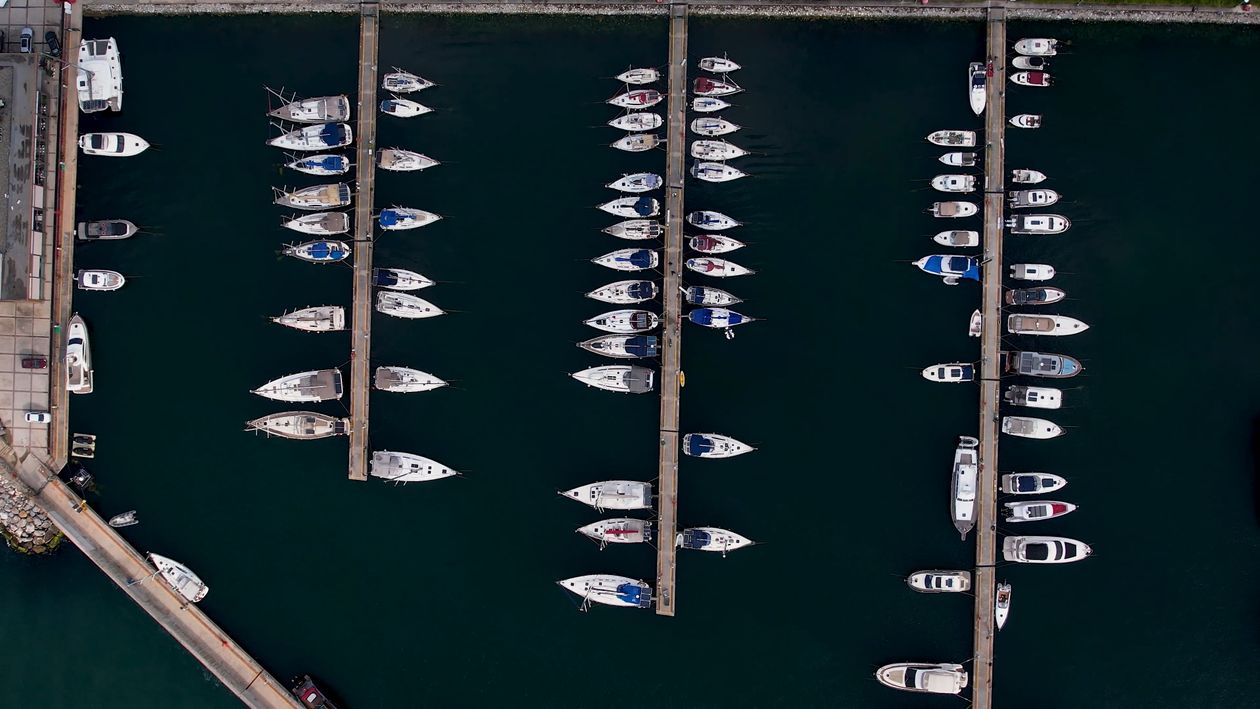 Aerial view of a marina with boats docked Free Stock Video Footage ...