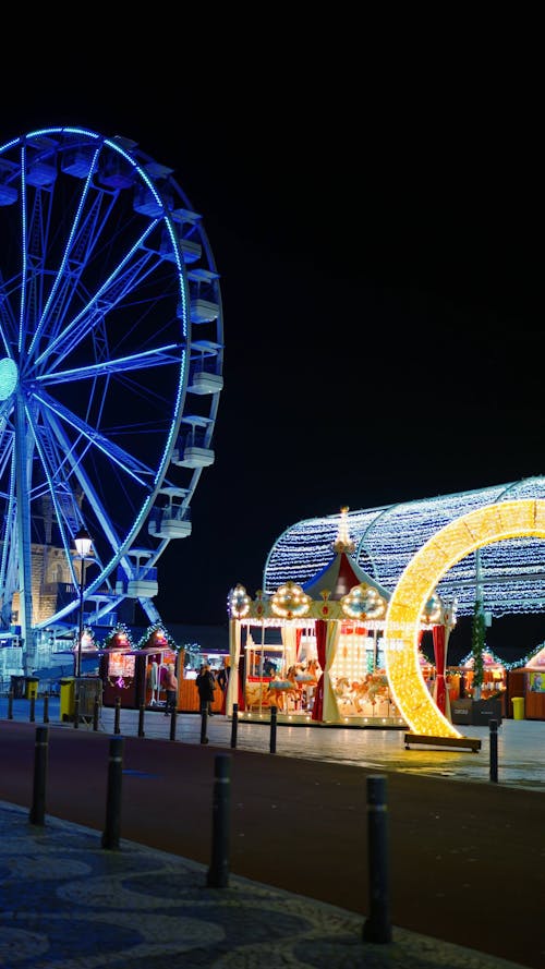 Christmas time in Cascais center with view at ferris wheel and attractions