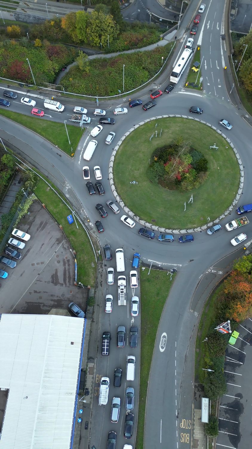 An aerial view of a roundabout with cars Free Stock Video Footage ...
