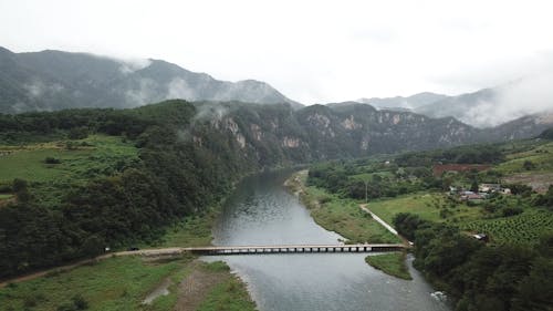 bridge, river in the rain